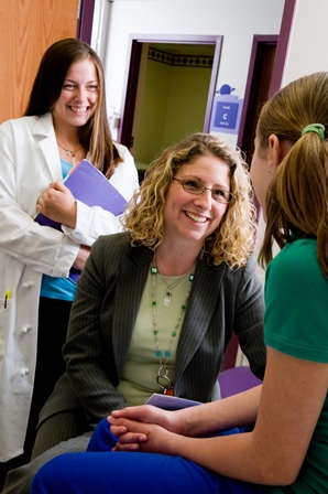 Dr. Mara Becker with a rheumatology researcher and patient with rheumatic disease.