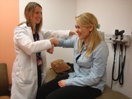 A rheumatoid arthritis patient is examined by a Rheumatologist.