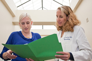 Lupus Clinc Director Dr. Maria Dall'Era with a lupus patient.