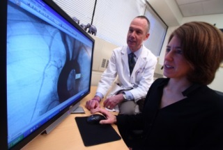Experienced rheumatologist mentors a trainee.